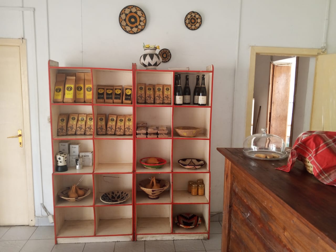 Shamba coffee bags and Burundian craft display