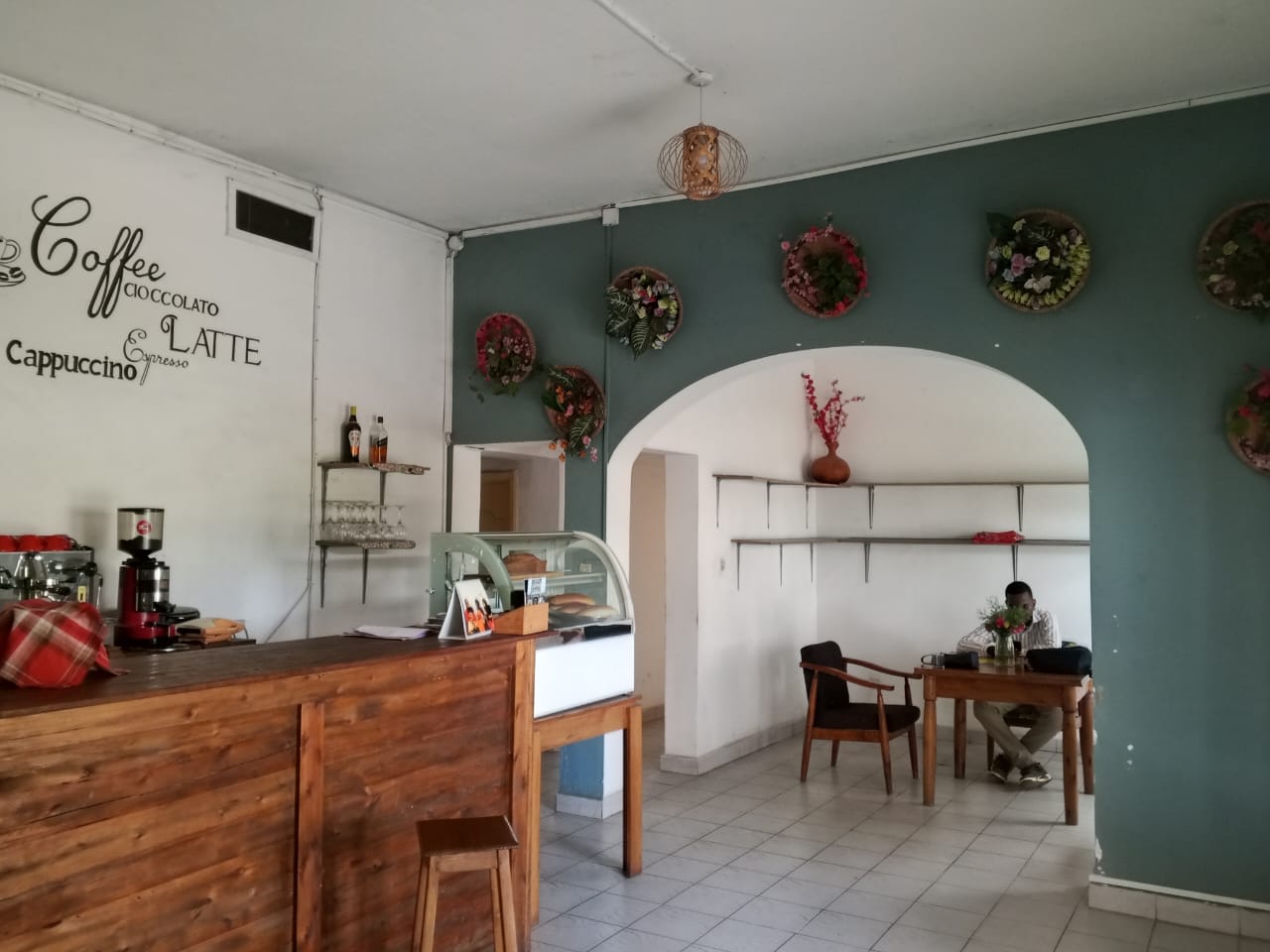 Café interior with floral wall decor